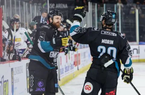 Ciaran Long celebrates the winning goal for Belfast Giants