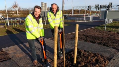 MPs Peter Bone and Tom Pursglove at Chowns Mill roundabout tree planting