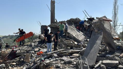 Emergency responders inspect the site of an Israeli strike in Saksakiyeh, Lebanon, on 9 May 2026.