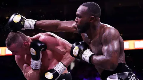 Viddal Riley aims a punch