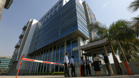 Security personnel stand guard outside the 鶹Լ's office in Mumbai