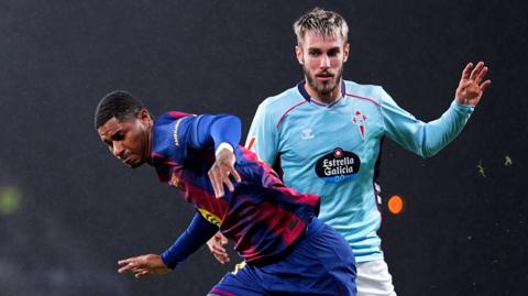 Celta Vigo player with Marcus Rashford