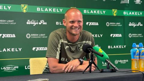 Norwich City head coach Liam Manning at a press conference