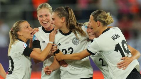 Jule Brand celebrates
