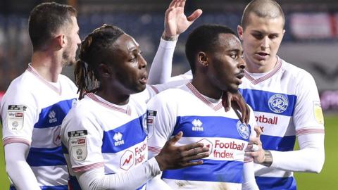 Osman Kakay, Bright Osayi-Samuel and Lyndon Dykes celebrate a goal for QPR