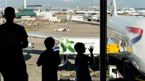 Family at Heathrow airport