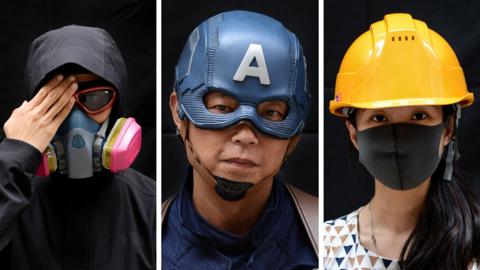 Protesters pos for a portrait during the Anti-Totalitarianism march in Causeway Bay, Hong Kong, 29 September 2019