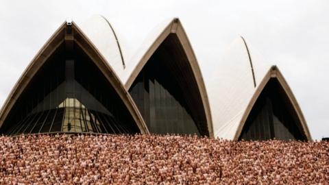 Naked people photographed by Spencer Tunick in front of the Sydney Opera House, 1 March 2010