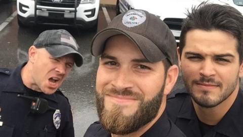 Viral photo of Gainesville police officers helping out with Irma posted on Facebook