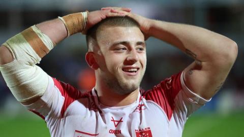 Hull KR's Mikey Lewis smiling with his hands on his head 