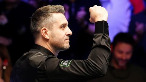 Mark Selby celebrates