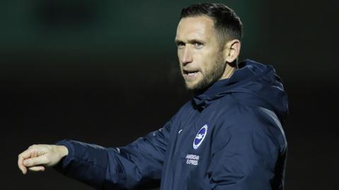 Andrew Crofts on coaching duty in a Brighton and Hove Albion coat