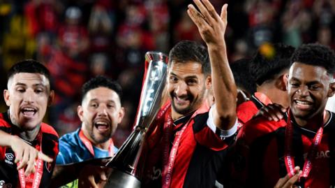 Alajuelense midfielder Celso Borges celebrates after winning the Concacaf Central American Cup final against Nicaragua's Real Esteli 