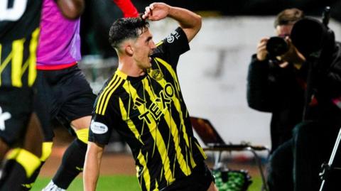 Jamie McGrath celebrates making it 2-0 to Aberdeen