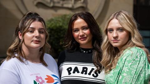 Hannah McLaughlan, Hannah Reid and Jennifer McCann outside the High Court in Glasgow