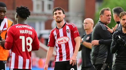 Exeter City midfielder Ed Francis celebrating after his side's win against Rotherham on August 10.