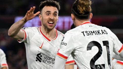 Diogo Jota and Kostas Tsimikas celebrate Liverpool's equaliser at Nottingham Forest