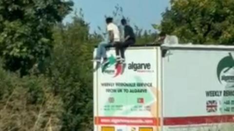 Suspected migrants on lorry