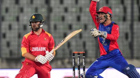 Zimbabwe's Ryan Burl in action against Afghanistan