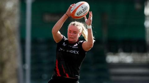 Fi McIntosh catches the ball from a lineout for Saracens