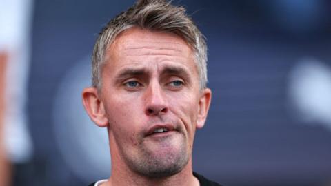 Kieran McKenna the head coach / manager of Ipswich Town looks on during the Premier League match between Manchester City FC and Ipswich Town FC at Etihad Stadium