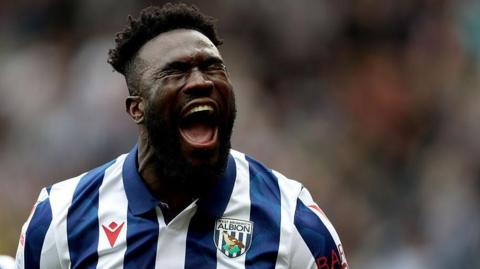 West Bromwich Albion striker Daryl Dike screams with joy as he scores