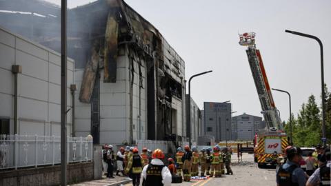 Tens of emergency work at the site of a deadly fire at a lithium battery factory owned by South Korean battery maker Aricell, in Hwaseong, South Korea, June 24, 2024.