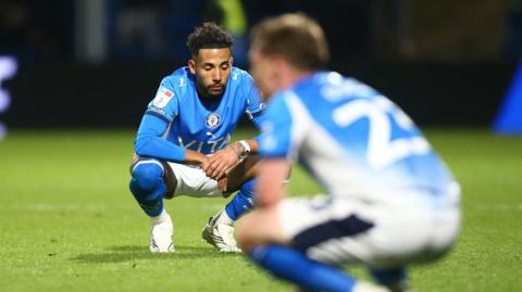 Odin Bailey looks dejected after Stockport County's defeat by Port Vale