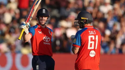 Harry Brook celebrates his half-century for England against India in fourth T20