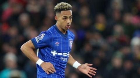 Omari Hutchinson in action for Ipswich