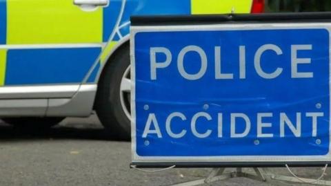 A stock shot of a sign that reads "Police Accident"