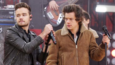 Liam Payne and Harry Styles of One Direction perform on 'Good Morning America' in Central Park in New York City in 2013