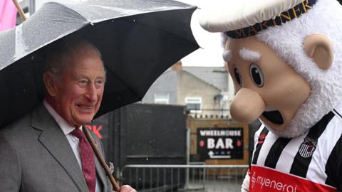 King Charles and the Grimsby Town club mascot The Mighty Mariner