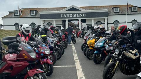 Motorbikes outside of Lands End building 