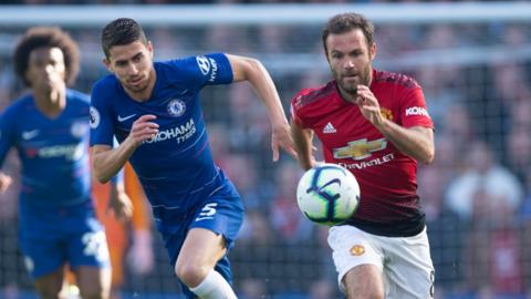 Jorginho of Chelsea and Juan Mata of Manchester United during the Premier League match between Chelsea FC and Manchester United at Stamford Bridge on October 20, 2018