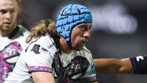 Justin Tipuic in possession for Ospreys against Dragons.