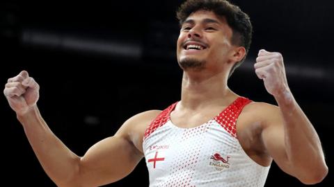 Gymnast Jake Jarman celebrates winning gold in the Commonwealth Games men's vault