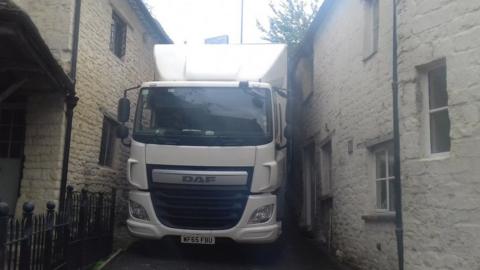 Lorry wedged in lane