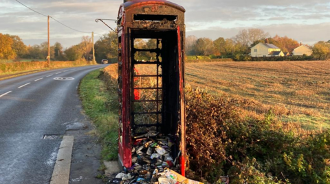 A burnt out phone box