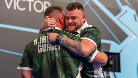 Daryl Gurney and Josh Rock celebrate