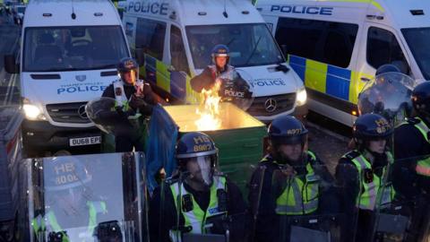 Police and protestors clashing in Southampton during a protest following the death of Henry Nowak.