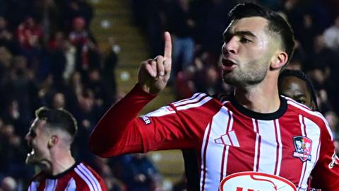 Reece Cole of Exeter City celebrates