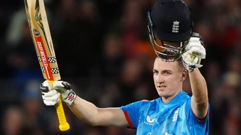 England captain Harry Brook celebrates hitting a century