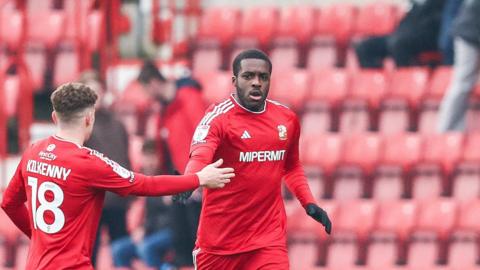 Nnamdi Ofoborh (right) in action for Swindon Town