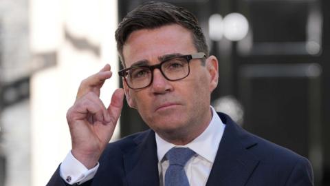 Britain's new Prime Minister Andy Burnham speaks to staff and media at 10 Downing Street in London, Monday, July 20, 2026