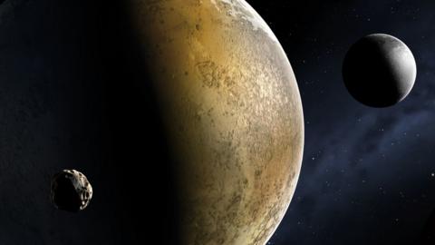 illustration of Pluto and moons
