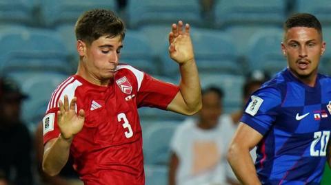Kai Mauro in action for Gibraltar against Croatia