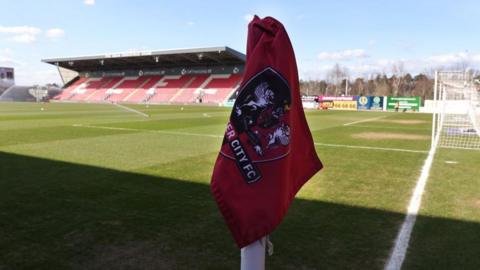 A general view picture of a corner flag with the Exeter City crest at St James Park in Exeter on a fine, sunny day.