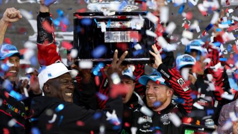 Michael Jordan and Tyler Reddick celebrate winning the Daytona 500