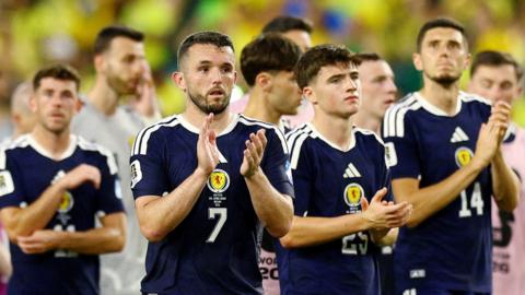 Scotland players clap